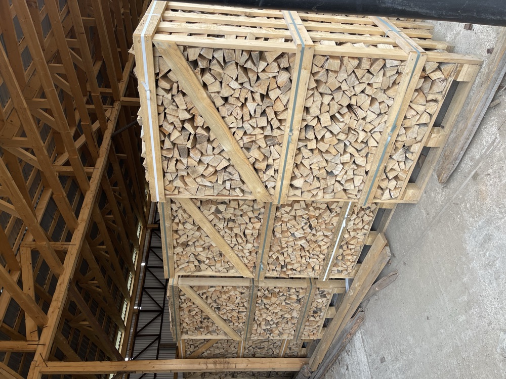 Split beech firewood in wooden crates