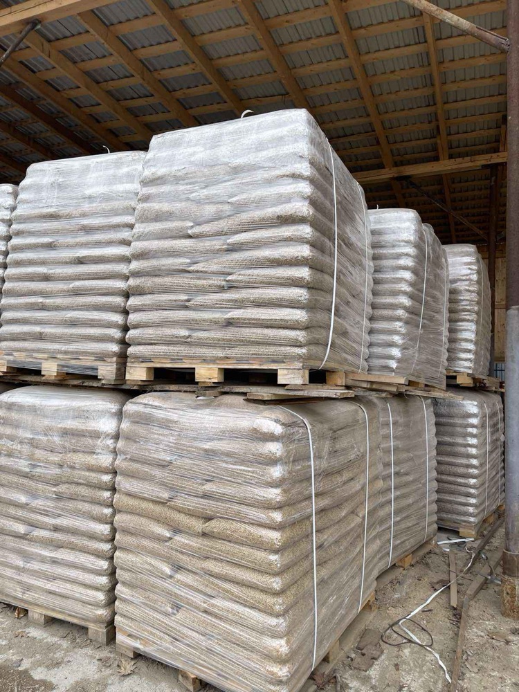 Pallets of bagged wood pellets, shrink-wrapped